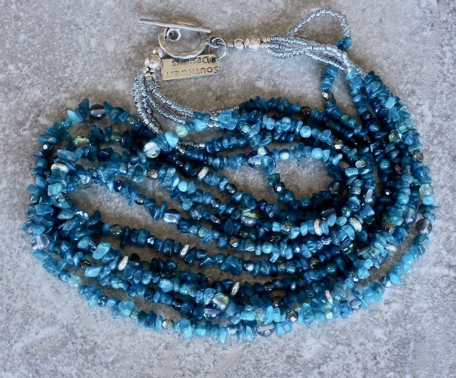 Blue Apatite Chip 5-Strand Necklace with Apatite Rounds, Tanzanite Crystal, Fire Polished Glass, Mystic Quartz Rounds, Blue-Gray Seed Beads and a Sterling Silver Toggle Clasp