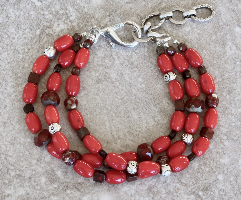 Bamboo Coral Barrel Bead 3-Stand Bracelet with Czech Glass, Red Jasper Cubes and a Silver Lobster Clasp