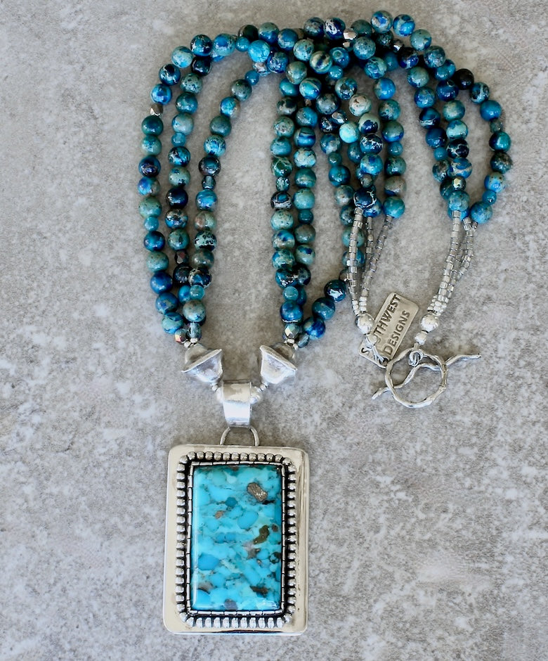 Kingman Turquoise and Sterling Silver Pendant with 3 Strands of Blue Sea Sediment Jasper Rounds, and Sterling Silver Beads and Toggle Clasp