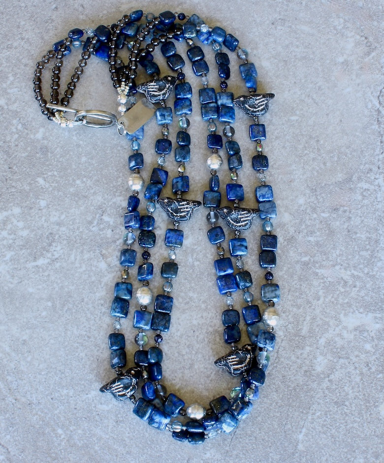 Lapis Squares 3-Strand Necklace with Czech Glass Black & Platinum Bird Fetishes, Czech Fire Polished Glass, Sterling Silver Beads, and Silver Platinum Toggle Clasp