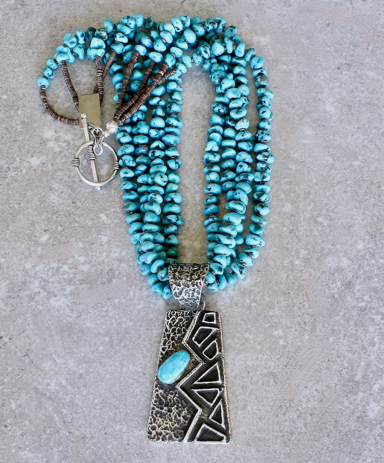 Merle House Turquoise and Sterling Silver Tufa Cast Pendant with 4 Strands of Turquoise Nuggets