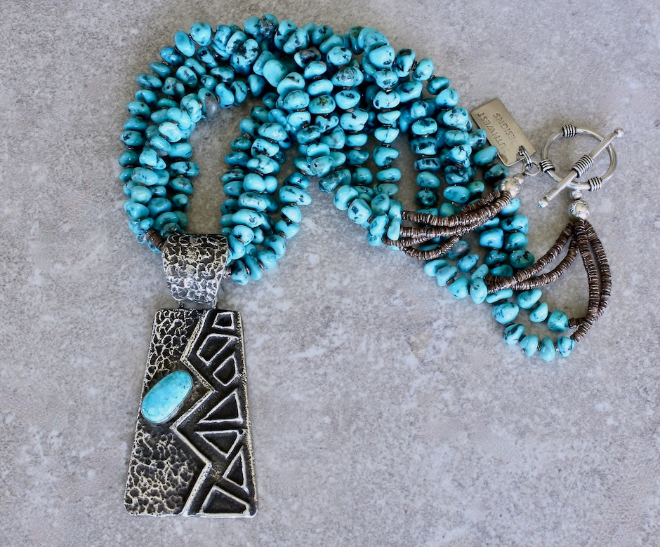 Merle House Turquoise and Sterling Silver Tufa Cast Pendant with 4 Strands of Turquoise Nuggets
