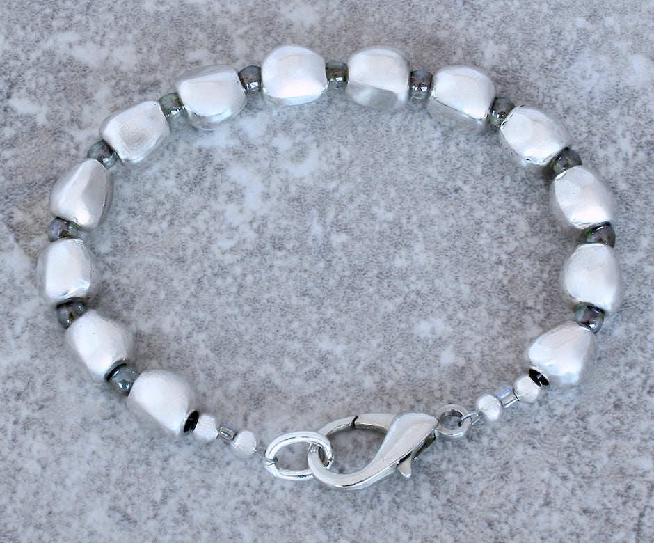 Pewter Near Rounds 13-Bead Bracelet with luminous green Czech Druk Glass Rounds and a Silver Lobster Clasp
