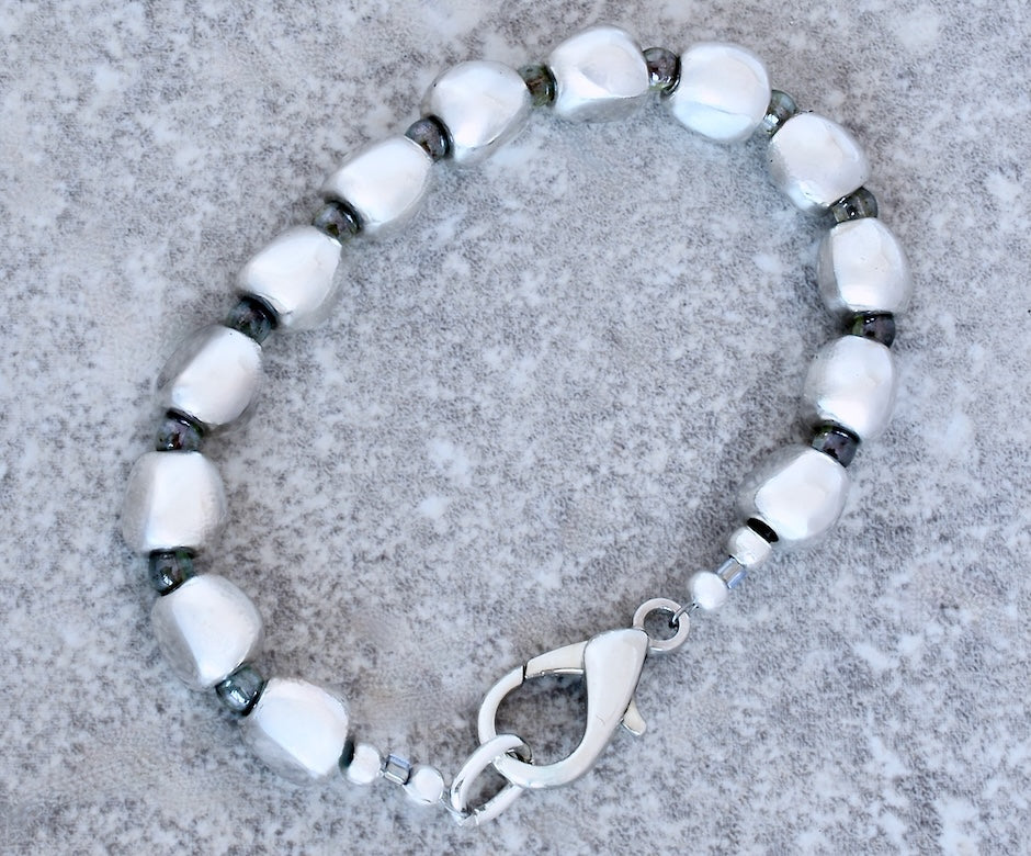 Pewter Near Rounds 13-Bead Bracelet with luminous green Czech Druk Glass Rounds and a Silver Lobster Clasp