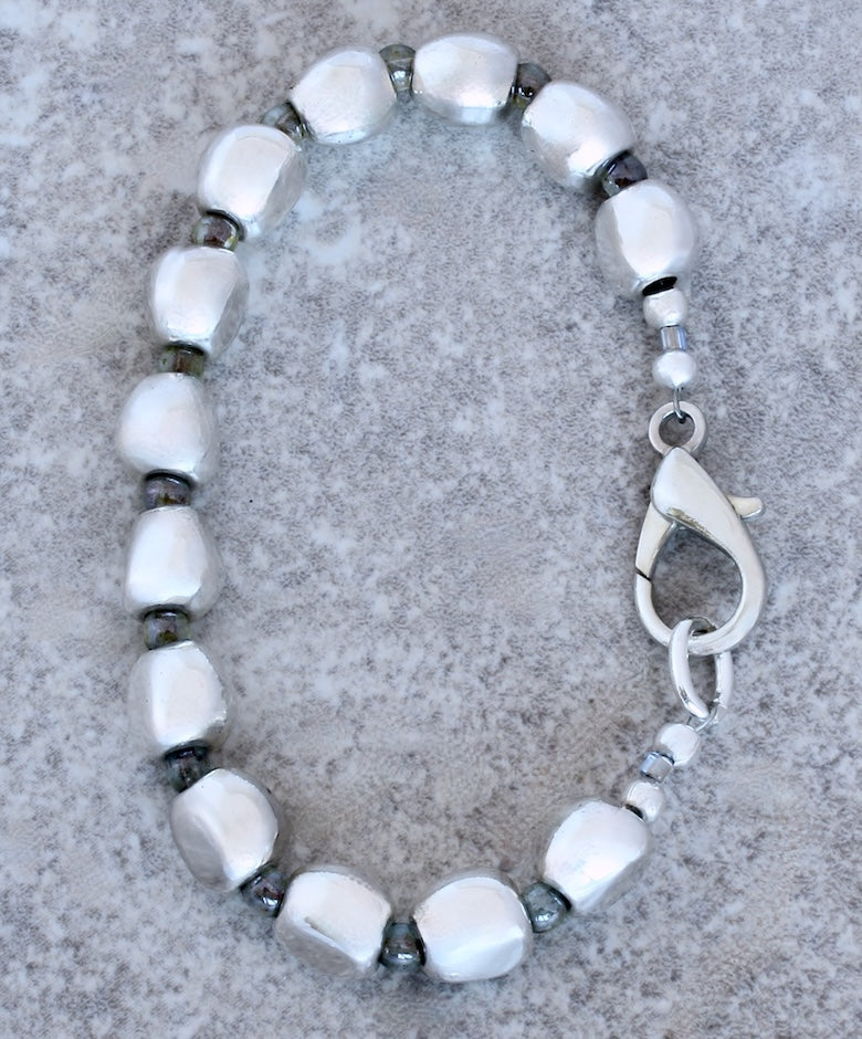 Pewter Near Rounds 13-Bead Bracelet with luminous green Czech Druk Glass Rounds and a Silver Lobster Clasp
