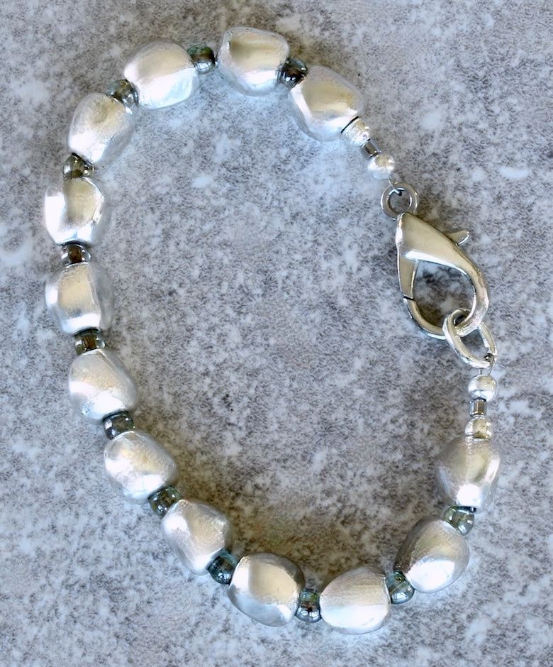 Pewter Near Rounds 13-Bead Bracelet with Luminous Green Czech Druk Glass Rounds and a Silver Lobster Clasp