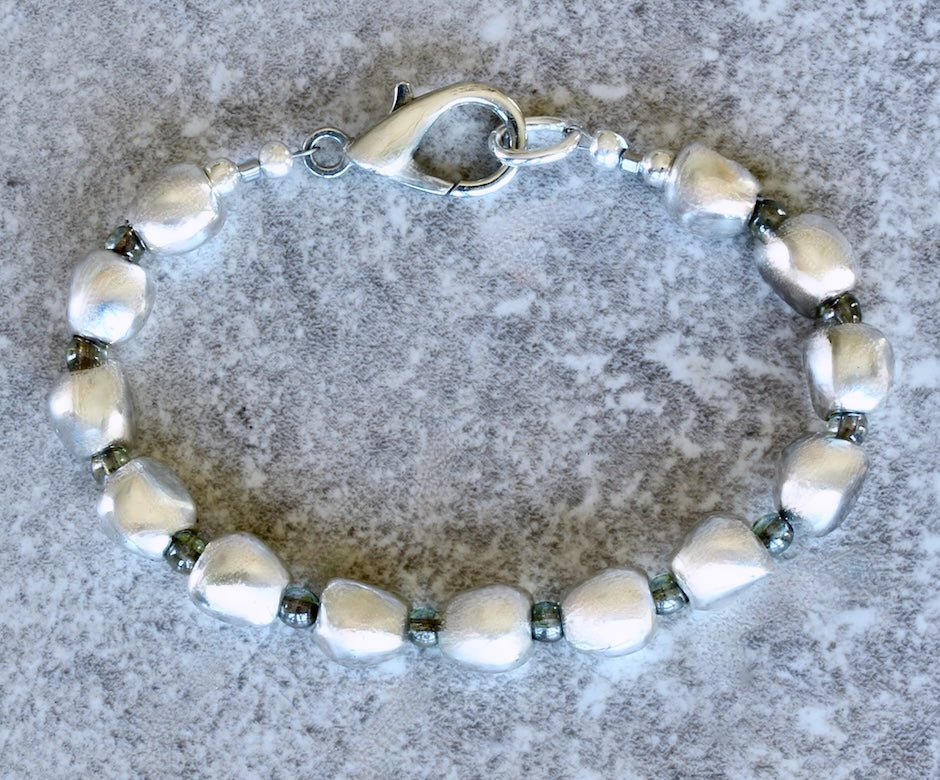 Pewter Near Rounds 13-Bead Bracelet with Luminous Green Czech Druk Glass Rounds and a Silver Lobster Clasp