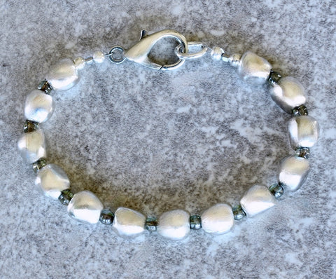 Pewter Near Rounds 13-Bead Bracelet with Luminous Green Czech Druk Glass Rounds and a Silver Lobster Clasp