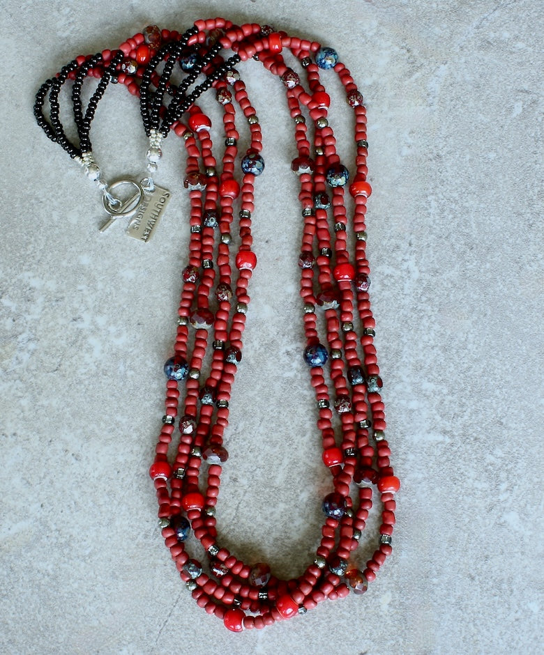 Red Indonesian Glass Bead 4-Strand Necklace with Czech Glass, White Heart Beads, and a Silver Pewter Toggle Clasp