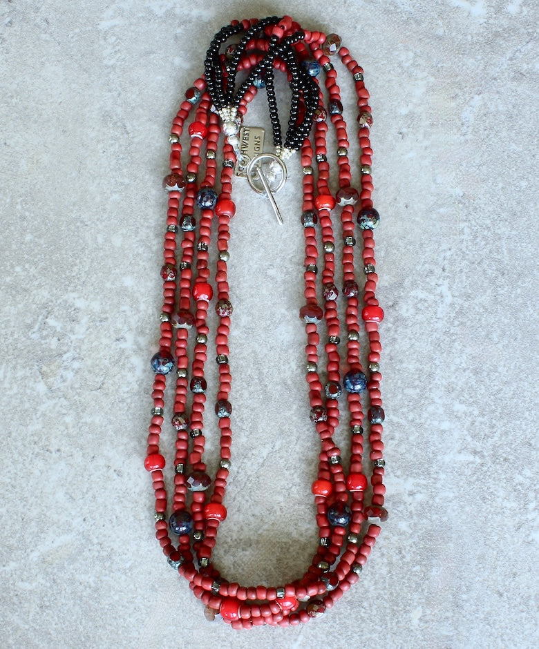 Red Indonesian Glass Bead 4-Strand Necklace with Czech Glass, White Heart Beads, and a Silver Pewter Toggle Clasp