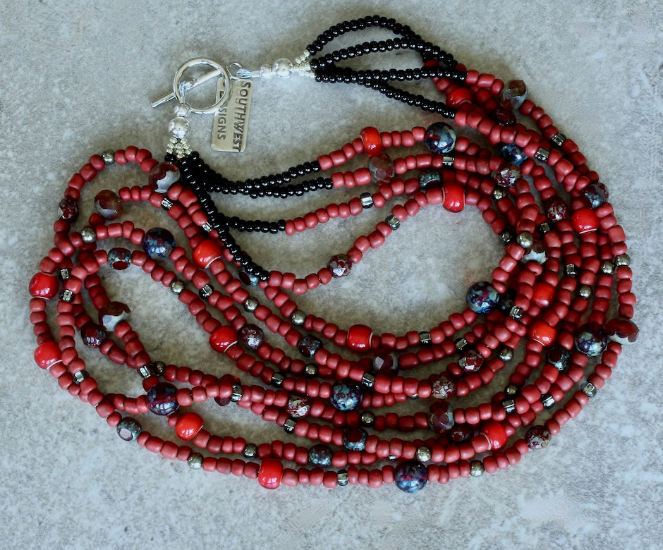 Red Indonesian Glass Bead 4-Strand Necklace with Czech Glass, White Heart Beads, and a Silver Pewter Toggle Clasp