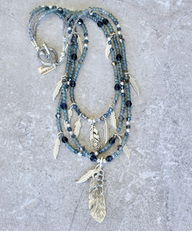 Czech Glass 3-Strand Necklace with a Silver Feather Pendant, 12 Silver Feather Charms, and a Silver Toggle Clasp