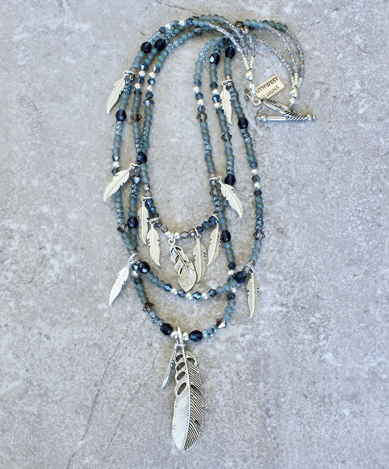 Czech Glass 3-Strand Necklace with a Silver Feather Pendant, 12 Silver Feather Charms, and a Silver Toggle Clasp