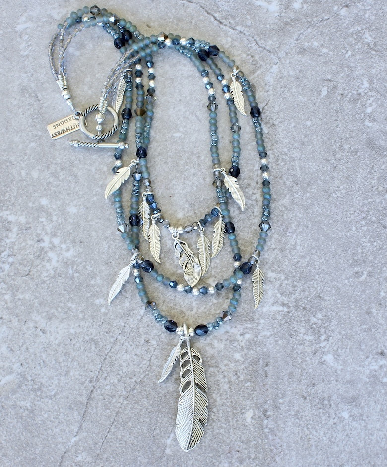 Czech Glass 3-Strand Necklace with a Silver Feather Pendant, 12 Silver Feather Charms, and a Silver Toggle Clasp