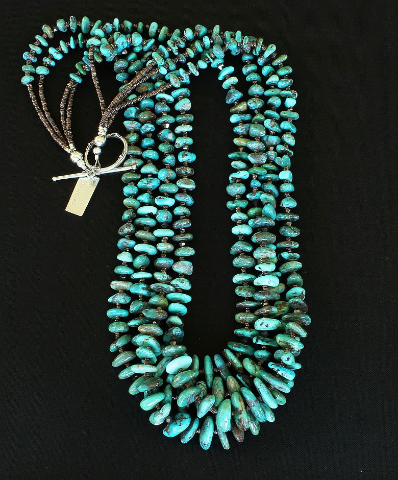 Nevada Turquoise Graduated Nugget 4-Strand Necklace with Olive Shell Heishi and a Sterling Silver Toggle Clasp