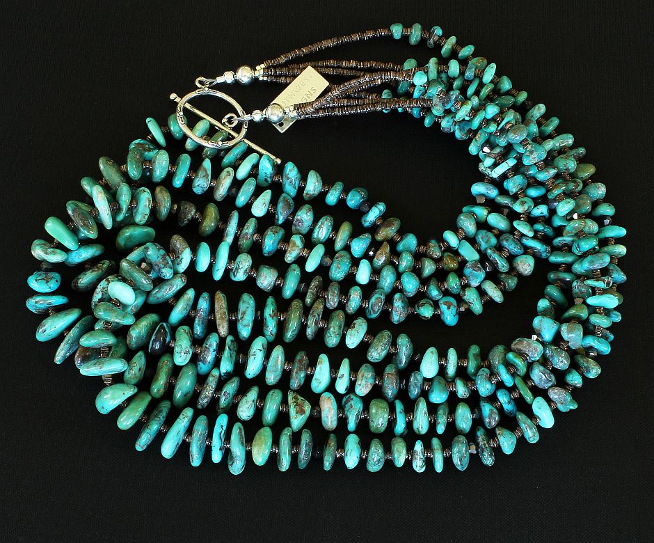 Nevada Turquoise Graduated Nugget 4-Strand Necklace with Olive Shell Heishi and a Sterling Silver Toggle Clasp