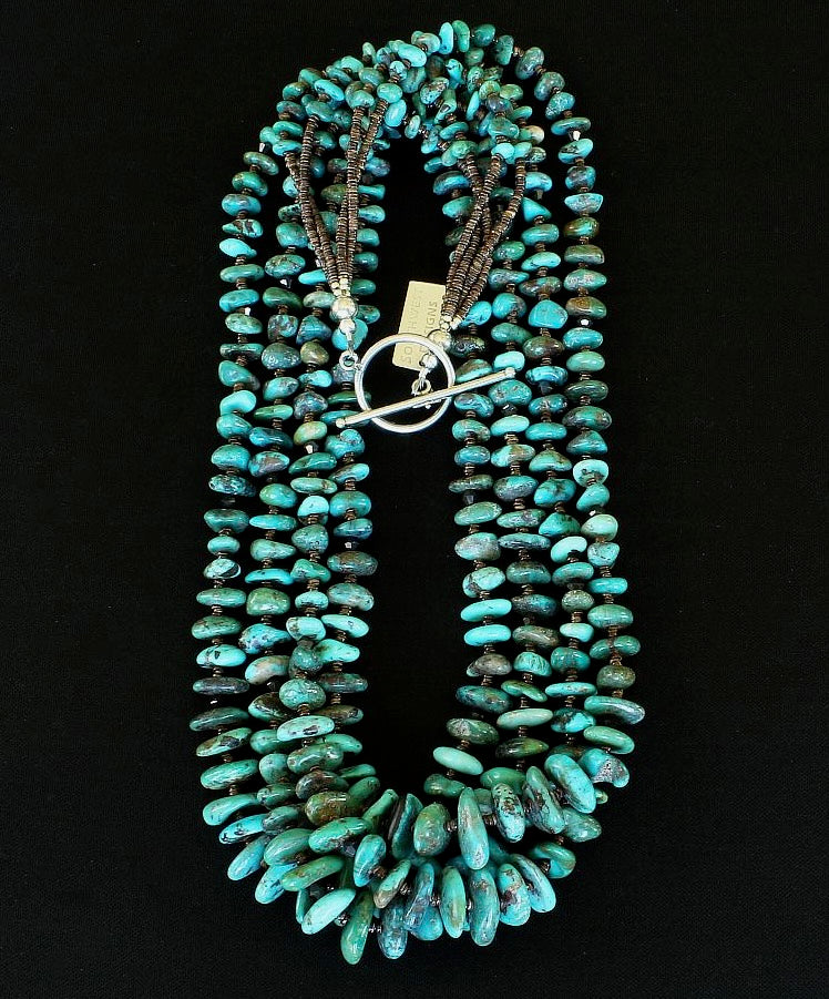 Nevada Turquoise Graduated Nugget 4-Strand Necklace with Olive Shell Heishi and a Sterling Silver Toggle Clasp